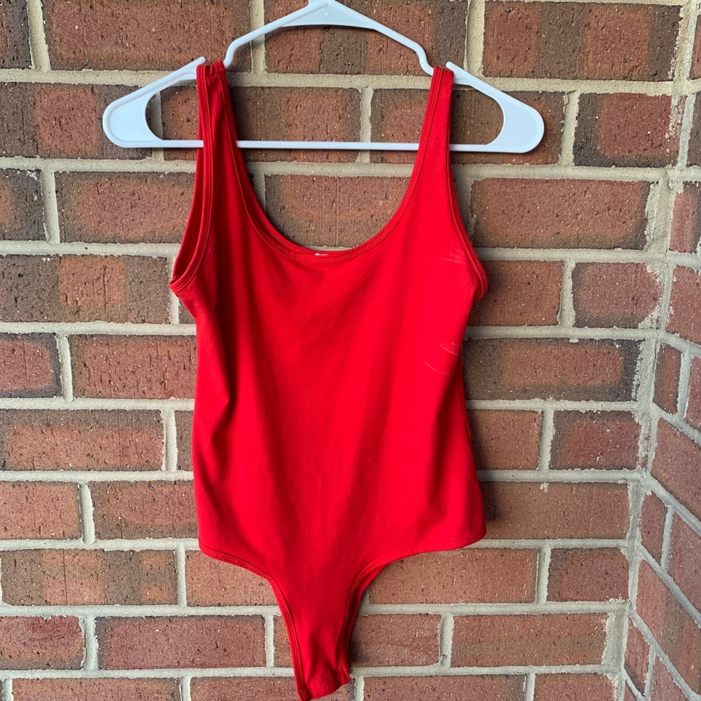 Red sleeveless bodysuit